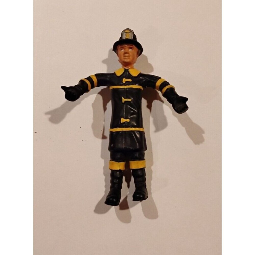 Five (5) inch tall, female firefighter action doll, 1984